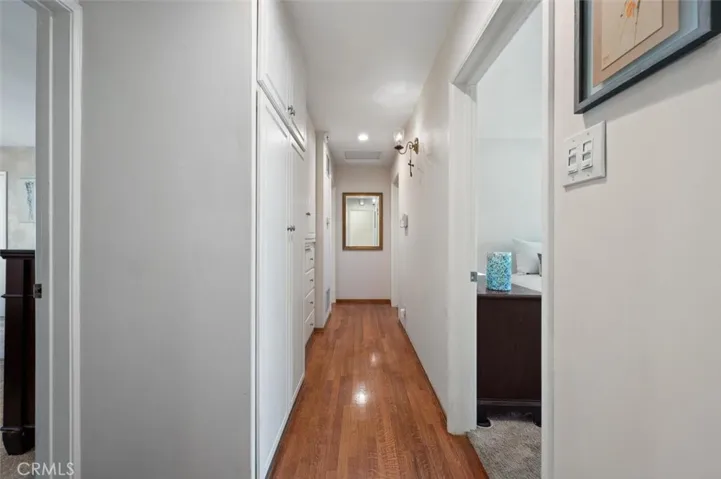 Hallway with tons of storage.