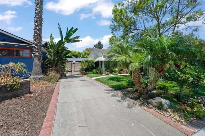 Long gated drive leads to the detached 2 car garage. Lots of off street parking!