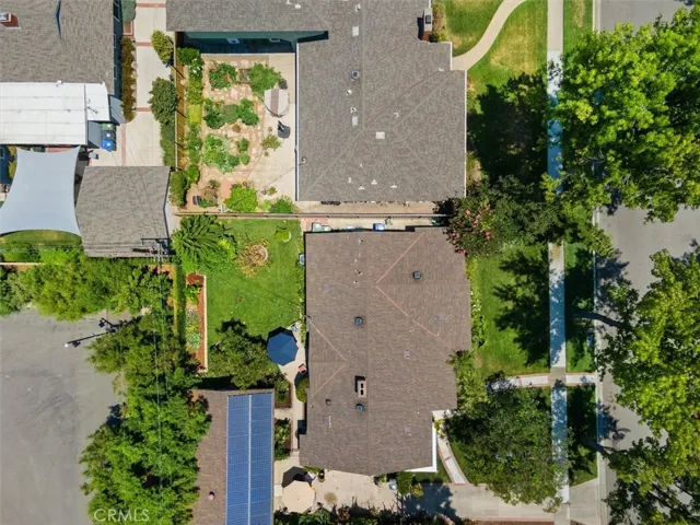 Birds eye view. Note 20 solar panels on garage roof.