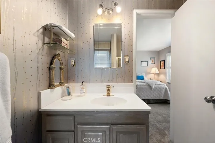 Main bath with new counters and fixtures.