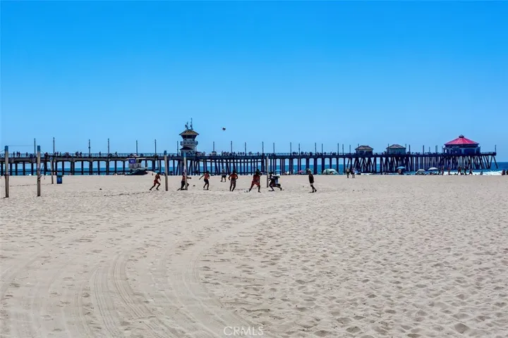 Endless volleyball and the Huntington Beach Pier.