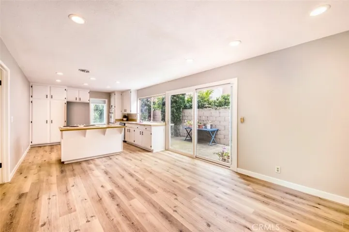 Family room flows into kitchen.