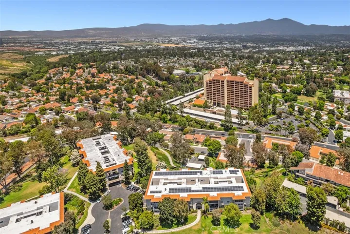 Aerial view of building facing Saddleback Mountains.