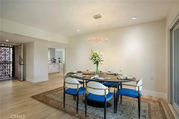 Beautiful dining area facing entrance to kitchen
