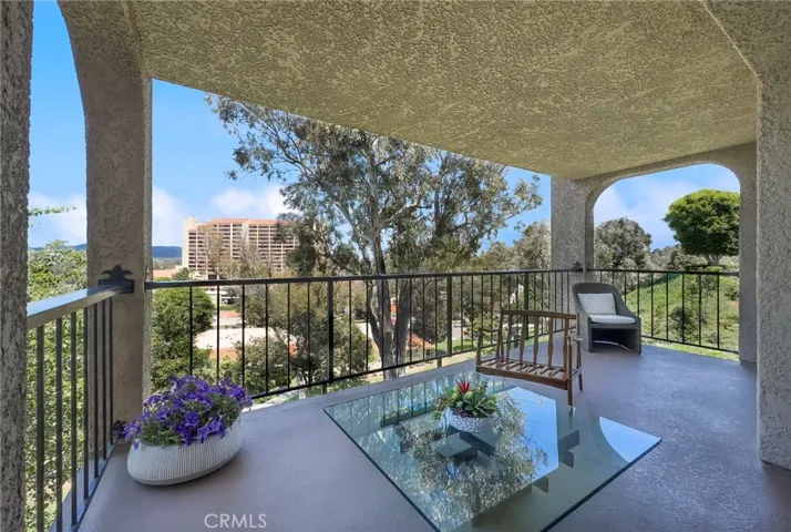 Beautiful deck with views of greenbelt, trees and mountains