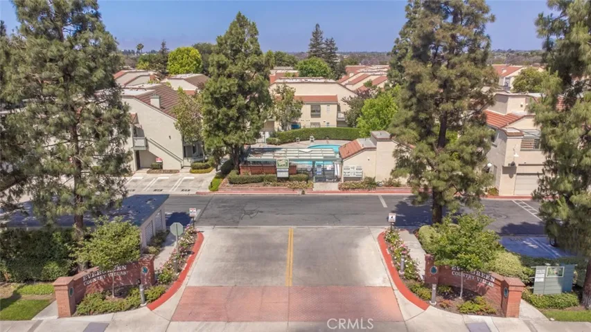 Welcome to Evergreen Village -  a beautifully landscaped community full of mature trees.