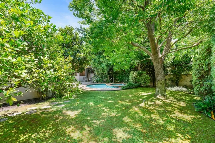 Lush backyard with mature trees