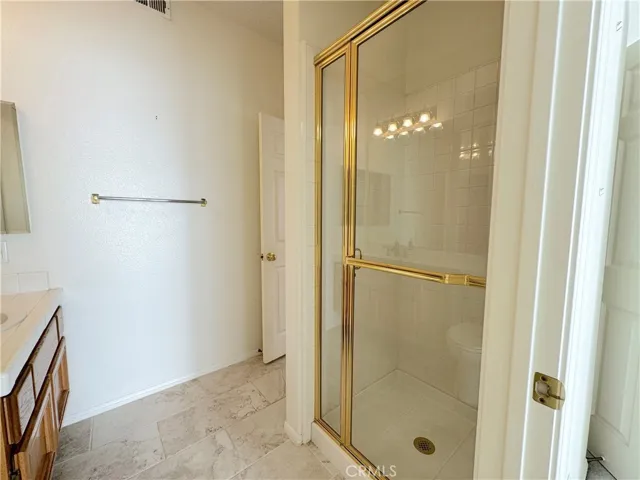 Bathroom downstairs with shower stall