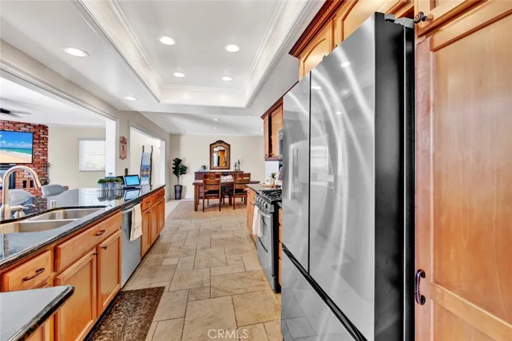 Remodeled Kitchen with Granite countertops, Custom Cabinetry, and Stainless Appliances