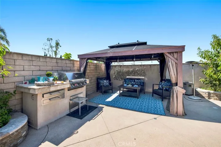 Backyard has Built-In BBQ Center and Gazebo