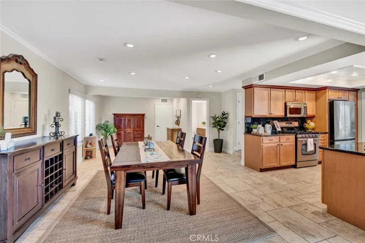 Banquet-Size Formal Dining Room Open to Kitchen and Family Room