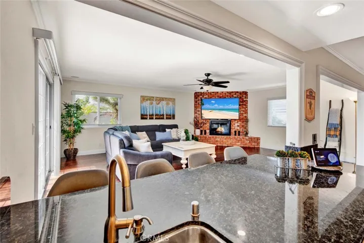 Kitchen has Breakfast Bar Open to Giant Family Room