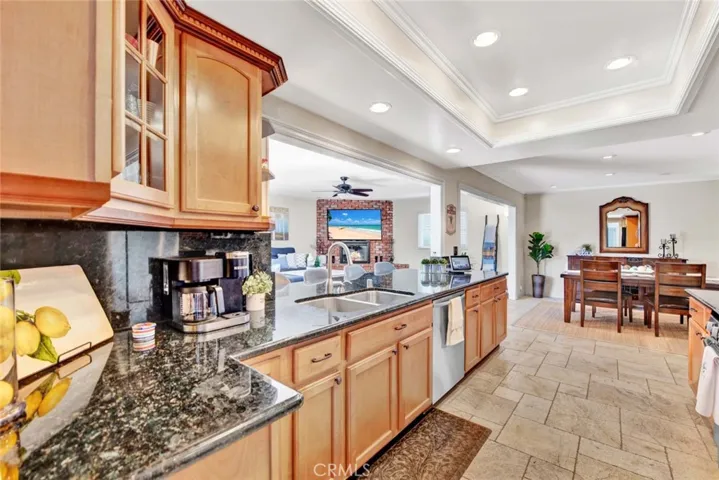 Remodeled Kitchen has Tray Ceiling with Recessed Lighting