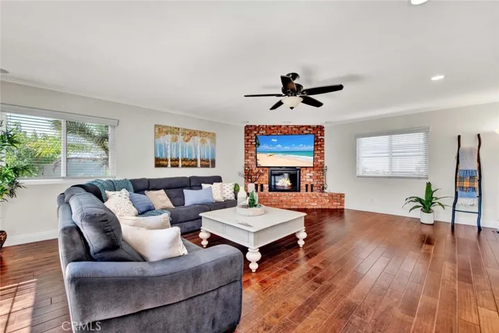Amazing Family Room Addition with Recessed Lighting, Ceiling Fan, and Fireplace