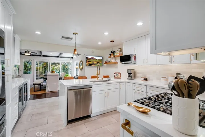 Remodeled kitchen to family room and additional dining areas.