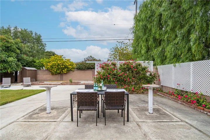 The expansive backyard has been designed with privacy in mind
