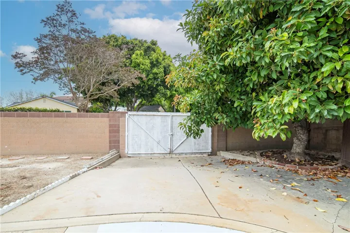 One R.V. access gate is on the North side of the home off of Rossmoor Way.