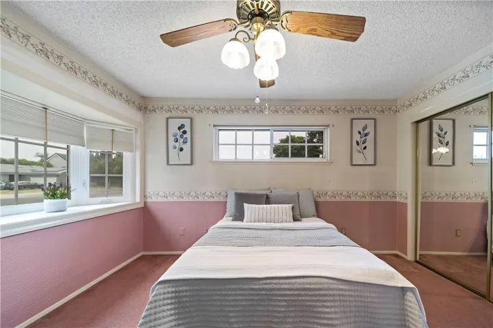 Levelor window coverings in master bedroom.
