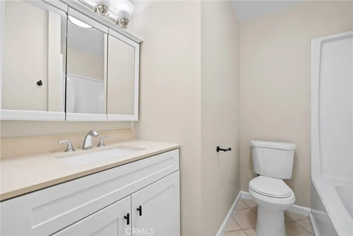 Nicely sized hallway bathroom with a vanity area.