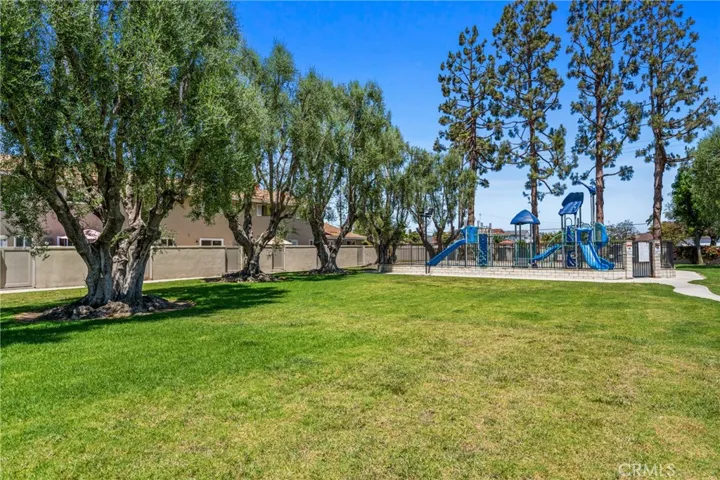 Beautifully landscaped green areas for leisurely walks and pet-friendly living.
