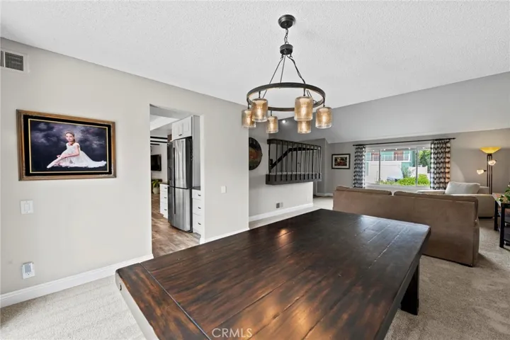 Dining area open to Living room and Kitchen