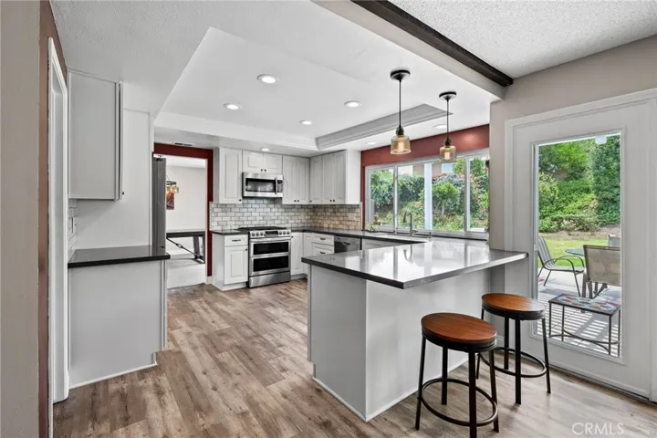 Kitchen open to Dining area