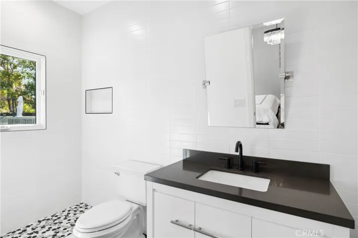 en suite bathroom to bedroom 3