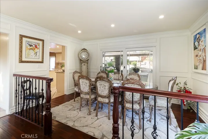 Dining Room with Slider to out door patio, bar b q, pool area