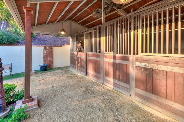 Upgraded 2 stall barn with covered front breezeway.