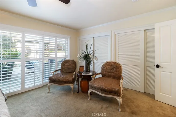 Spacious primary suite, louvered door closets with built in drawers and shelves.