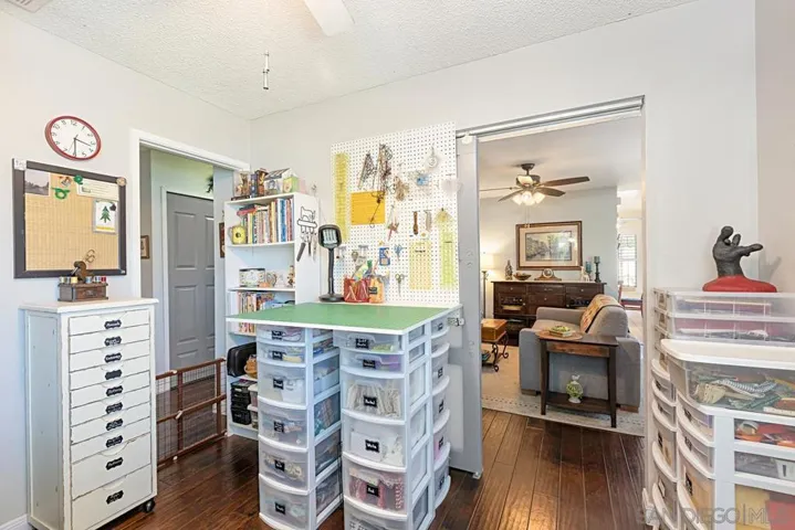 Bedroom being used as sewing/hobby room.