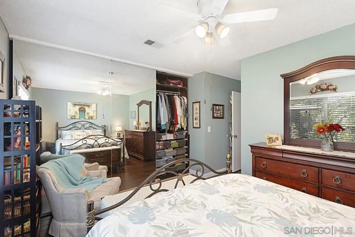 The primary bedroom has a convenient closet organizing system.