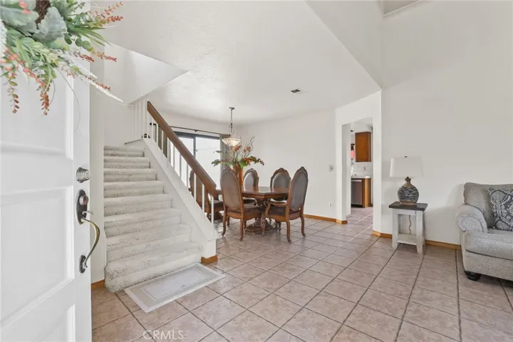 Upon entering the front door, you are welcomed by the living room to your right, dining room to your left, and the kitchen and family room are at the back of the house.