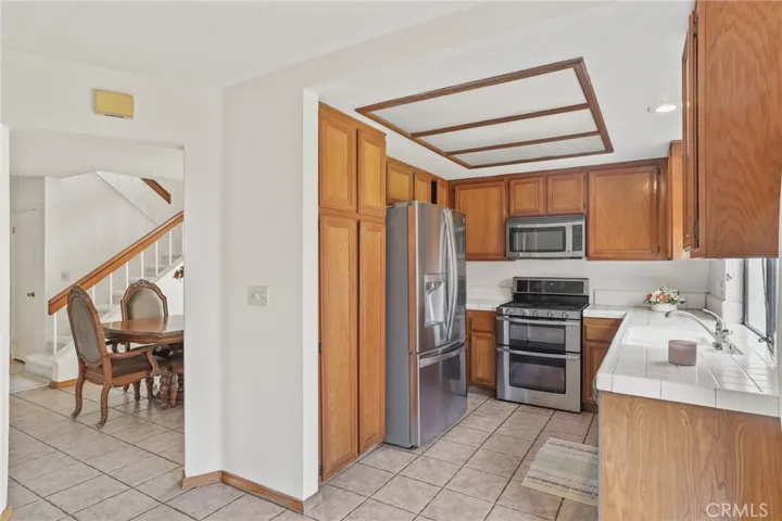 The dining room is conveniently located next to the kitchen.