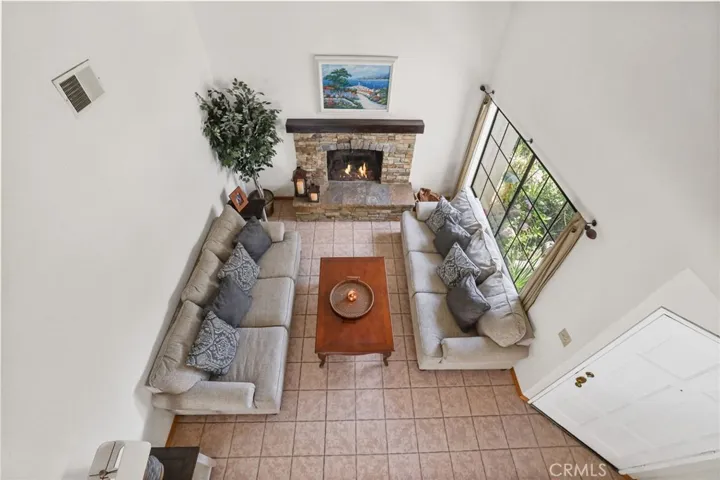 A view of the beautiful living room from the second floor hallway.