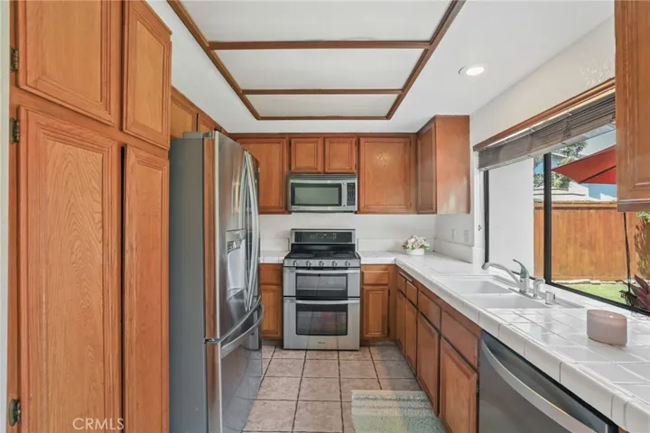 The kitchen is upgraded with all stainless-steel appliances including the double ovens. You can truly enjoy your own backyard while preparing the meals for the entire family.