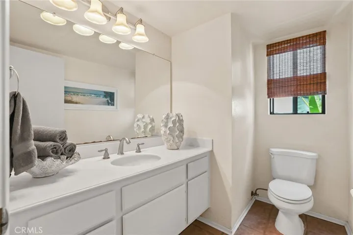 The half bathroom on the first floor, simple and functional.