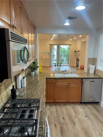 Kitchen view to dining and living room