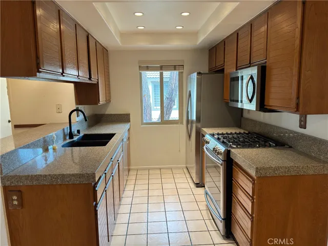 Lease Now - 2 bedroom, 2 baths, 1 car attached garage. Upstairs unit with balcony.  Refrigerator, Washer & Dryer included