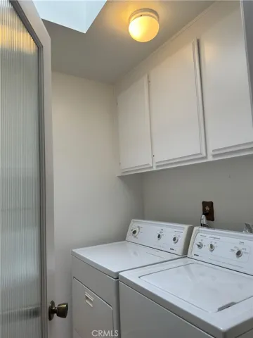 Lease Now - 2 bedroom, 2 baths, 1 car attached garage. Upstairs unit with balcony.  Refrigerator, Washer & Dryer included