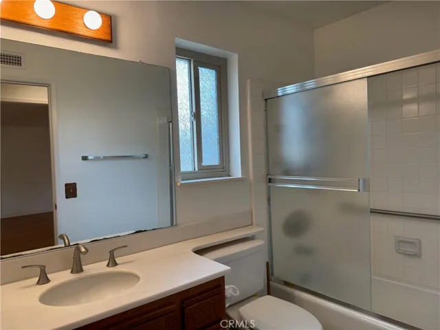 Lease Now - 2 bedroom, 2 baths, 1 car attached garage. Upstairs unit with balcony.  Refrigerator, Washer & Dryer included
