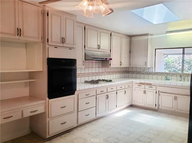 Large kitchen with loads of cabinets