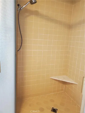Primary bath with a tiled stall shower