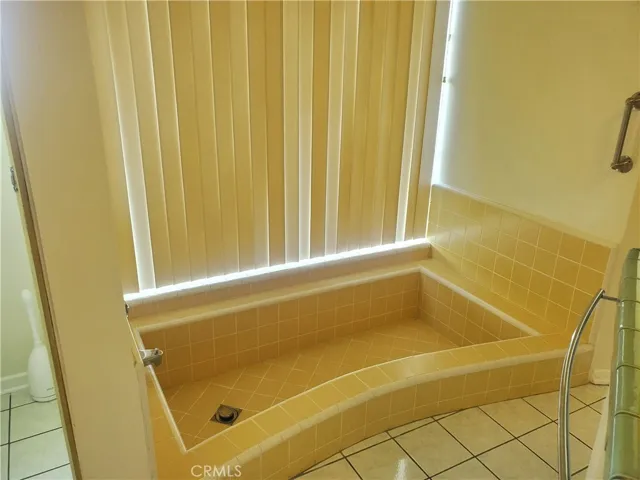 Primary bath with a sunken bathtub