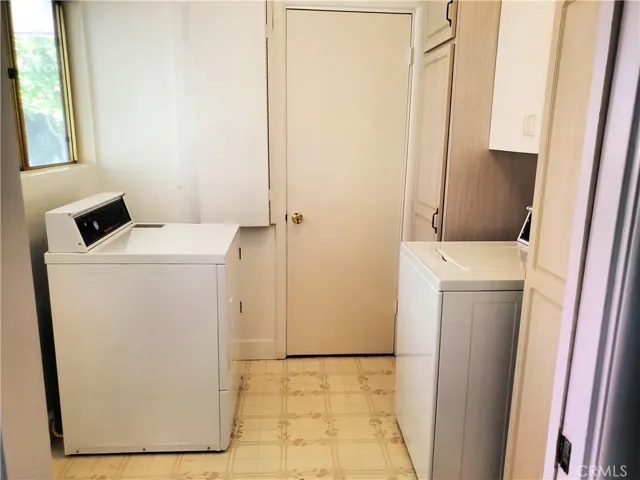 Laundry room with storage. Washer & dryer included