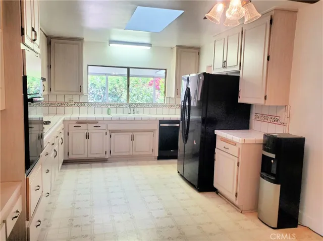 Large kitchen with refrigerator included