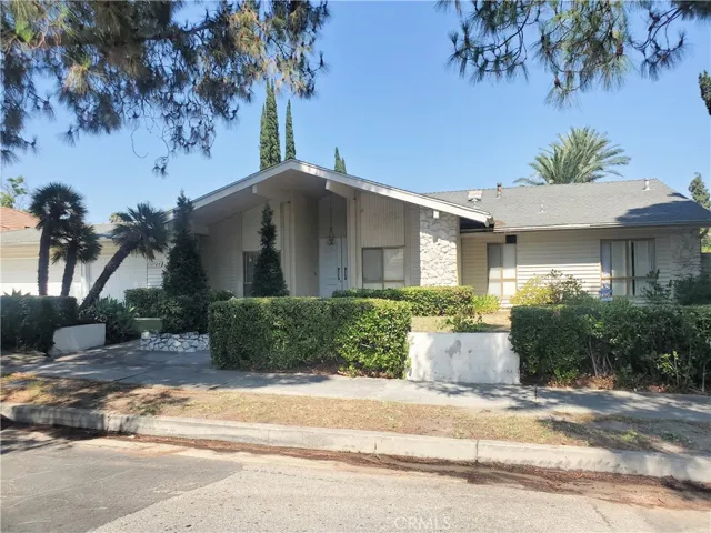 Single-story home with nice curb appeal.