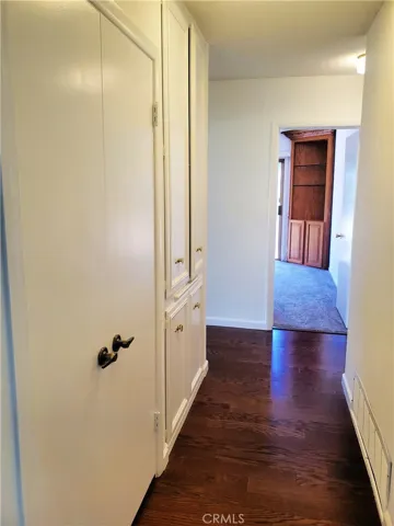 Hallway to bedrooms with good storage space