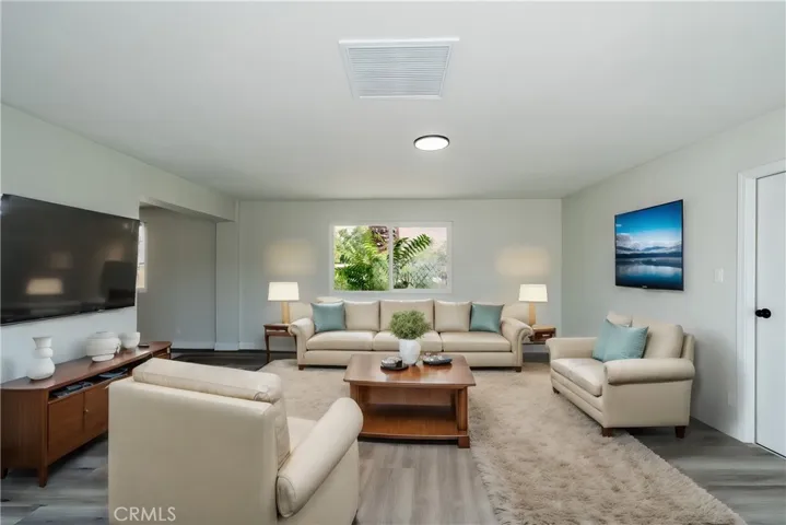 family room view from backyard (virtually staged)