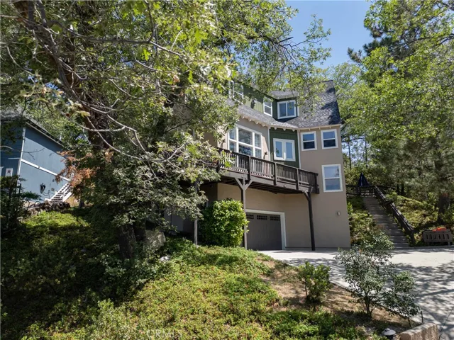 View of top of driveway and garage entry
